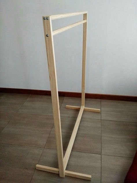 Diy Clothes Rack Easy, Pile Of Clothes, Wooden Clothes Hanger, Wooden Clothes Rack, Diy Clothes Rack, Bongkar Pasang, Clothing Store Design, Hanger Stand, Boutique Decor