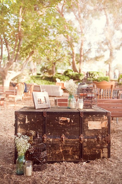 Love this vintage trunk, birdcages, & mason jars with flowers & candles Trunk Wedding Decor, Simple Wedding Reception, Nevada Wedding, Wooden Trunk, Deco Champetre, March Wedding, Vintage Picnic, Mason Jar Flowers, Vintage Trunks