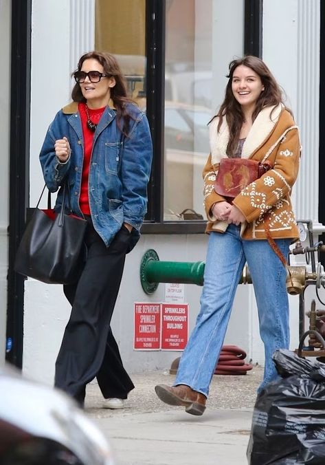 Katie Holmes' lookalike daughter Suri, 17, almost towers over her mom in rare NYC outing | HELLO! Katie Holmes Style, Suri Cruise, City Mom, Light Denim Jeans, Brown Cowboy Boots, Tan Coat, Style Moodboard, Long Dark Hair, Oversized Denim Jacket