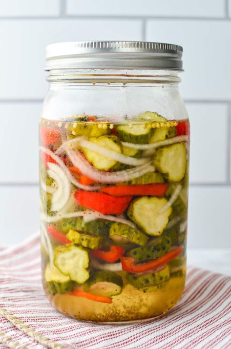 This easy recipe for Amish Refrigerator Pickles uses just a handful of ingredients, and is adapted from an old-fashioned Amish recipe. Sweet, sour, and perfectly crisp. Amish Refrigerator, Pickles Refrigerator, Quick Pickled Vegetables, Refrigerator Pickle Recipes, Vinegar Cucumbers, Pickle Recipes, Sour Pickles, Pickles Recipe, Quick Pickled