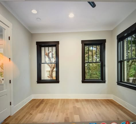 Indoor Black Window Trim, Black Trim Interior Farmhouse, Black Window Seal Interior, Black Windows White Trim Living Room, Black Window Trim White Baseboards, Dark Window Trim White Baseboards, Houses With Black Trim Interior, Beige Walls Black Windows, Black Windows Brown Trim