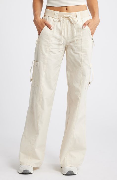 Lots of pockets lend utility to these baggy cargo pants made of lightweight cotton. 32 1/2" inseam; 25" leg opening; 10 1/2" front rise; 14" back rise (size Medium) Elastic/drawstring waist Side zip pockets; cargo patch pockets 100% cotton Machine wash, line dry Imported Pants Trend 2024, White Cargo Pants Outfit, 2024 Fits, Linen Outfits, Cargo Pants Outfits, White Cargo Pants, Cotton Cargo Pants, Baggy Cargo Pants, Cargo Pants Outfit