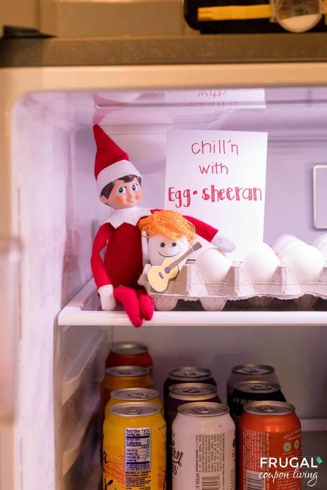 Want a funny Elf on the Shelf idea? How about one with Pun? Make this silly Egg Sheeran Elf on the Shelf idea using chicken eggs. New Elf on the Shelf ideas daily plus free Elf on the Shelf printables. #FrugalCouponLiving #ElfontheShelf Elf On The Shelf Ideas For Dec 1, Very Easy Elf On The Shelf Ideas, Elf On Shelf Cute Ideas, Super Funny Elf On The Shelf Ideas, Elf On The Shelf Ideas Funny Innapropriate, Elf On The Shelf Funny Inappropriate, Raunchy Elf On The Shelf Ideas, Elf On The Shelf Im Back Ideas Funny, Elf On The Shelf Teenager Ideas Funny