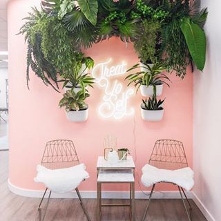 Image may contain: people sitting, plant, table and indoor Vertical Garden Wall Planter, Nail Salon Interior, Esthetician Room Decor, Esthetics Room, Spa Room Decor, Salon Suites Decor, Esthetician Room, Nail Salon Decor, Vertical Garden Wall