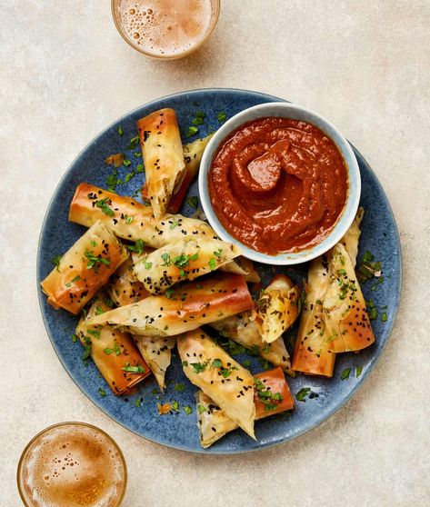 Yotam Ottolenghi’s party finger food: cheesy potato filo cigars, herby devilled eggs and fried crumpets – recipes | Snacks | The Guardian Filo Cigars, Finger Food Lunch, Cheese Finger Food, Biscuits Cheese, Brunch Sweets, Otto Lenghi, Crumpet Recipe, Yotam Ottolenghi Recipes, Savoury Finger Food