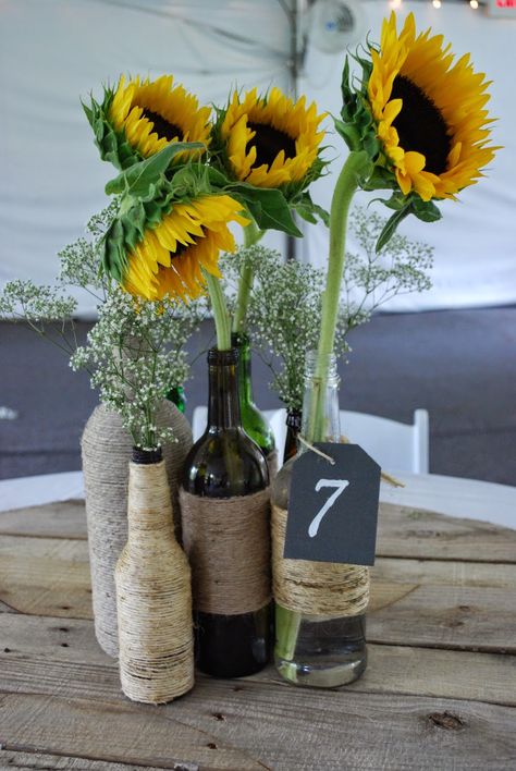 sunflower Summer Wedding Centerpieces, Wine Bottle Centerpieces, Wrapped Wine Bottles, Sunflower Centerpieces, Sunflower Themed Wedding, Summer Centerpieces, Bottle Centerpieces, Diy Table Decor, Simple Centerpieces