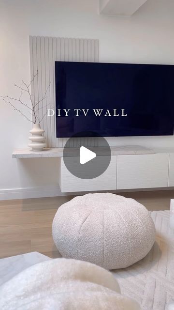 DIY - IKEA Hack on Instagram: "@cb_loves_interiors_20 shared this IKEA Besta hack creating a sleek, wall-mounted TV unit with style. By adding white Laxviken door fronts and a custom-cut laminate worktop shelf, she elevated the basic Besta into a chic media center.   The finishing touch is DIY paneling made from MDF strips. It’s a perfect blend of IKEA basics and creative customization for a high-end look.   For more ideas and inspiration, be sure to check out Cheryl’s page @cb_loves_interiors_20  . . #ikeahack #ikea #ikeahome #ikeaideas #ikealover #interiordesign #diy #HomeDecor #diyideas #diyproject #home #HomeDIY #InteriorDesign" Ikea Hacks Tv Wall Unit, Ikea Media Wall Hack, Besta Ikea Living Room, Besta Ikea Ideas Inspiration, Ikea Besta Living Room Ideas, Diy Tv Unit, Diy Paneling, Ikea Tv Wall Unit, Ikea Besta Tv