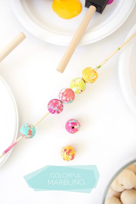 Grab some paint and learn how to paint wooden beads in a variety of different patterns.. Paint Wooden Beads, Wooden Bead Jewelry, Wood Beads Diy, Hand Painted Beads, Wooden Bead Garland, Wooden Bead Necklaces, Learn How To Paint, Wood Bead Garland, Beaded Garland