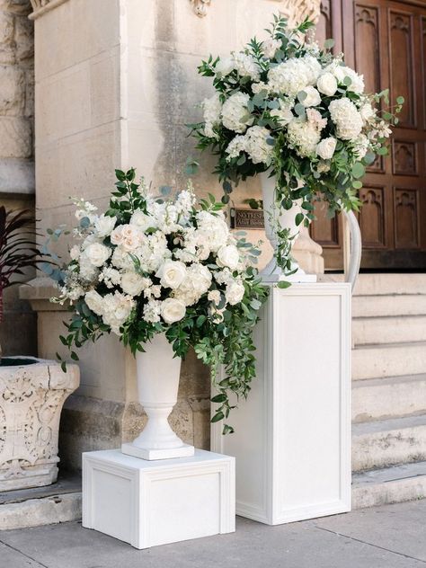 Classy Wedding Altar, Romantic White Wedding Flowers, Large White Floral Arrangements Wedding, Dramatic Wedding Entrance, White Columns Wedding Ceremony, Classic Wedding Flower Arrangements, Wedding Altar Arrangements, White Florals Wedding Centerpieces, White Fall Wedding Decor