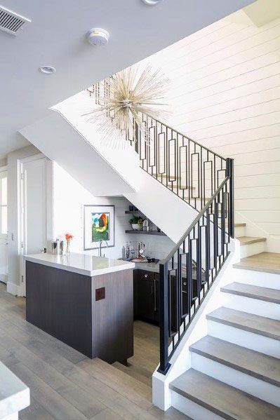 Top 70 Best Stair Railing Ideas - Indoor Staircase Designs Bar Under Stairs, Kitchen Under Stairs, Brandon Architects, تحت الدرج, House Staircase, Staircase Storage, Home Stairs Design, Modern Stairs, Understairs Storage