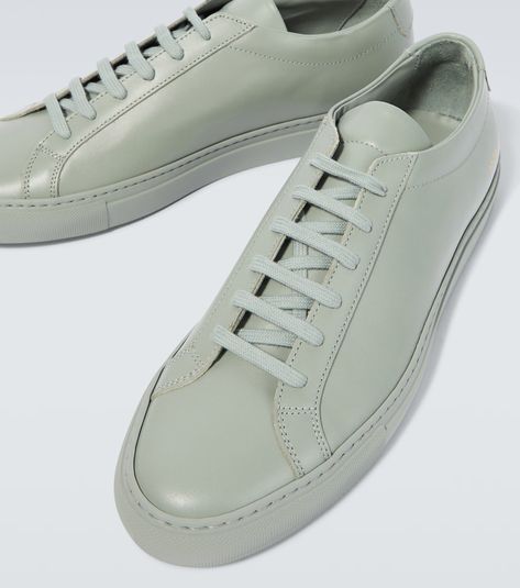 Original Achilles Low leather sneakers in green - Common Projects | Mytheresa Olive Leather Low-top Sneakers, Outdoor Low-top Leather Shoes With Stitched Sole, Leather Low-top Sneakers With Contrast Stitching, Common Projects Achilles Low, Common Projects Shoes, Common Projects Achilles, Common Projects Men, Name Vintage, Round Toe Sneakers