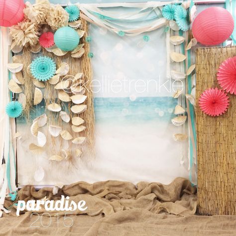 Raffia, paper lanterns, fans, tissue paper streamers, and seashell garland created a sweet backdrop for a paradise themed photo booth for a dance. Aqua, seafoam, coral, ivory, natural reeds, burlap created a muted beachy feel. Perfect for barefoot beach pictures! This would be beautiful for a wedding or reception, parties or other special occasions! #kellietrenkle #photographer #event #photobooth Ocean Photobooth Ideas, Ocean Photo Backdrop Diy, Beach Theme Party Backdrop, Ocean Themed Photo Booth, Beach Wedding Photo Booth, Beach Theme Photo Backdrop, Beach Photo Booth Ideas, Beach Theme Photo Booth, Ocean Photo Backdrop