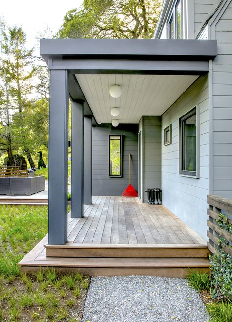 See How a Plain Dutch Colonial Became a Cool, Modern Farmhouse - SPACES Magazine Modern Pillars On Front Porch, Front Pillar Design Modern, Modern Porch Columns, Front Porch Pillar Ideas, Modern Front Porch Ideas Entrance, Front Porch Pillars, Porch Modern, Porch Pillars, Porch Extension