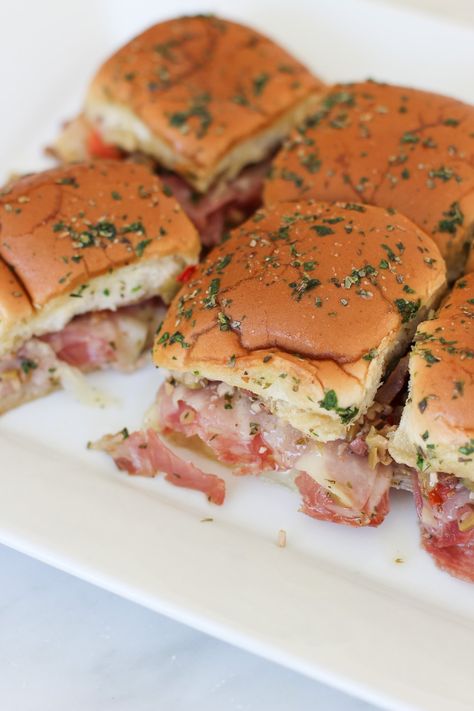 Muffuletta Sliders Hawaiian Roll Sliders Muffaletta, Muffaletta Sandwich Sliders, Mardi Gras Sandwiches, Muffalata Sliders, Louisiana Party Food, Mini Muffaletta Sliders, Cajun Sliders, Muffaletta Sliders, Muffuletta Sliders