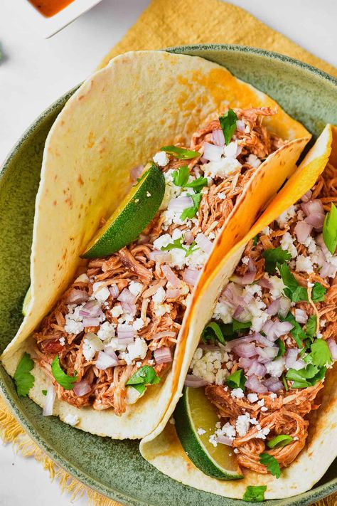 This authentic chicken tinga recipe is made with shredded chicken that's been simmered in a rich tomato sauce. Chipotle peppers give the sauce its smoky flavor and Mexican charm. Authentic Chicken Tinga Recipe, Authentic Chicken Tinga, Ancho Chicken, Chicken Tinga Tacos, Steak Rub Recipe, Tinga Recipe, Cheesy Chicken Recipes, Tinga Tacos, Chicken Tinga Recipe