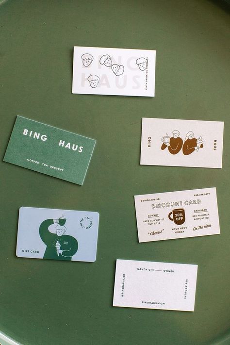 A creative business card design by Meiwen for Bing Haus, an ice cream shop that also serves coffee and tea. Inspired by old-school Korea, the clean sans serif logotype, retro monoline illustrations and an earthy colour palette, all elements can be seen on various card designs: business card, discount card, gift card and loyalty card. #businesscards #branding #identity #graphicdesign #brandinspiration #branddesign #namecards #typography #wordmark #businesscard #businesscarddesign Coffee Shop Loyalty Card Design, School Business Card Design, Loyalty Card Design Creative, Coffee Loyalty Card Design, Coffee Card Design, Business Gift Card Design, Discount Card Design Ideas, Business Card Illustration, Coffee Business Card