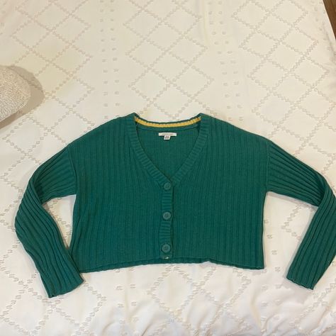 Super Cute Green American Eagle Sweater Is Size Small!! Never Worn, But No Tages. No Damage, 3 Buttons, V Neck Ish Shape. Comment For Any Questions. Green V-neck Sweater For Winter, Cheap Green Button-up Sweater, Trendy Green Knit V-neck Sweater, Green Knit V-neck Sweater For Winter, Oversized Green V-neck Sweater, American Eagle Sweater, Button Front Cardigan, Womens Cardigan, Cardigan Tops