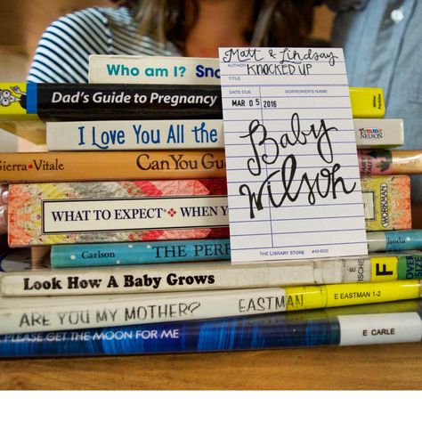 Cute Library Themed Pregnancy Announcement #pregnancyannouncement Book Themed Pregnancy Announcement, Bookish Pregnancy Announcement, Bookish Baby Announcement, Book Baby Announcement, Book Pregnancy Announcement, Literary Nursery, Nerdy Nursery, Baby Announcing Ideas, Pregnancy Date