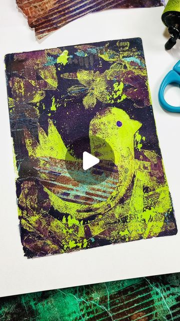 Gelli Arts® Gel Printing on Instagram: "It is DAY 1 of our #MarchPrintingChallenge 🎉

We’re starting off with our very first prompt: CARDBOARD!😊 

Gelli Artist® @michelle_mixedmedia took cardboard and tore some of the top layer off to expose the ridged part underneath.  She pressed it onto the wet paint on the Gelli Arts® Gel Plate to lift some of the paint off to create random marks. She did a few layers like that with different colors to create paper to collage. Next, she cut some cardboard into very simple bird and branch shapes. 

She pressed them into wet paint on the plate and then drew an eye on her bird with an acrylic paint pen. In addition, she pressed a flower applique piece into the paint. She then rolled on her last layer of paint and pulled the print. Finally, she cut a sim Gelli Printing Art Lesson, Gelli Print Collage, Jelly Printing, Gelly Plate, Gelli Printing Tutorials, Gel Plate Printing, Gelli Printing Techniques, Dog Stencil, Printmaking Projects