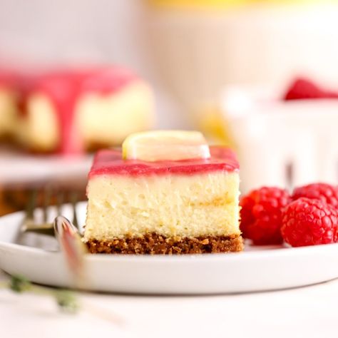 Lemon Raspberry Cheesecake Bars Lemon Raspberry Cheesecake Bars, Lemon Raspberry Cheesecake, Raspberry Cheesecake Bars, Lemon Cheesecake Bars, Frozen Cheesecake, Yummy Cheesecake, Raspberry Recipes, Spring Desserts, Raspberry Cheesecake