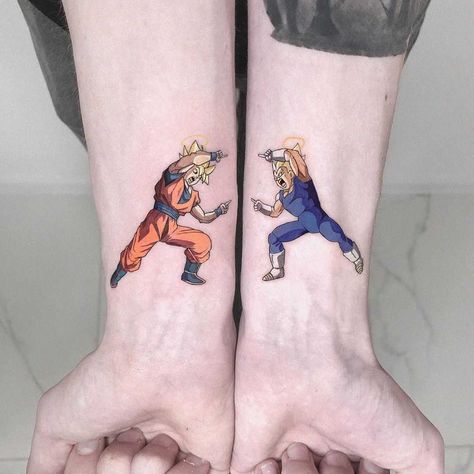 Dragon Ball Z Fusion tattoo by Eden Kozo inked on both wrists Reborn Tattoo, Fist Tattoo, Dbz Tattoo, Dance Tattoo, Brother Tattoos, Goku Y Vegeta, Z Tattoo, Dragon Ball Tattoo, Omerta Tattoo