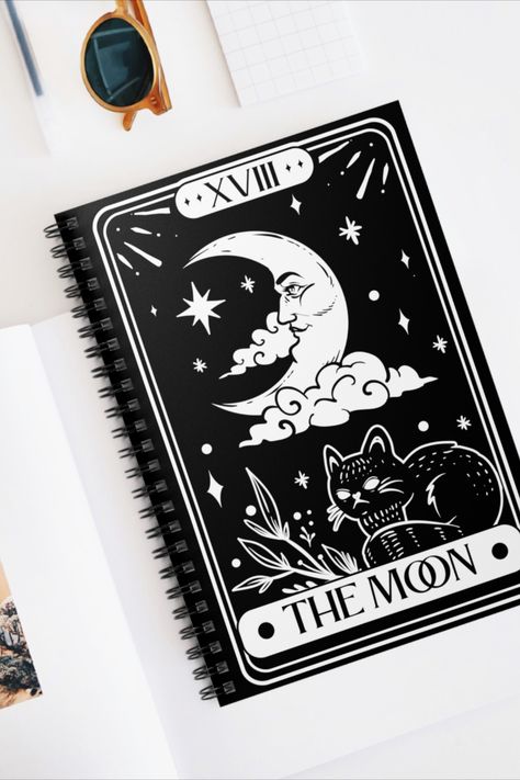 Embrace enchanting mystique with our Moon Tarot Notebook. Perfect for witches and tarot enthusiasts, this goth-inspired journal is adorned with moonlit tarot imagery. Capture your insights, spells, and musings in style. Elevate your witchcraft journey with this unique Moon Tarot Journal. A must-have for every magical soul. Journal cover, Goth, Witch, Tarot, Pretty Journals, Journal covers, Notebook cover, Notebook aesthetic, Witchy Notebook Cover, Goth Bullet Journal, Tarot Notebook, Goth Notebook, Witchy Notebook, Witch Notebook, Heavenly Quotes, Witchy Journal, Notebook Aesthetic