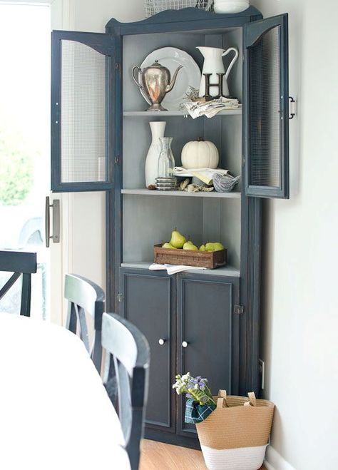 a graphite grey corner cabinet for storage and displaying any decorative objects Corner Cupboard Makeover, Corner Cupboard Living Room, Corner Hutch Ideas, Corner Shelf Cabinet, Corner Hutch Makeover, Painted Corner Cabinet, Hutch Redo, Bedroom Furniture Redo, Corner Cupboards