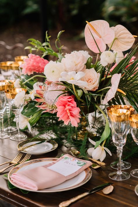 Tropical Pink Centerpieces Tropical Centerpieces, Tropical Wedding Theme, Pink Centerpieces, Tropical Flower Arrangements, Wedding Glassware, Fiesta Tropical, Outdoor Wedding Reception, Hawaiian Wedding, Maui Weddings