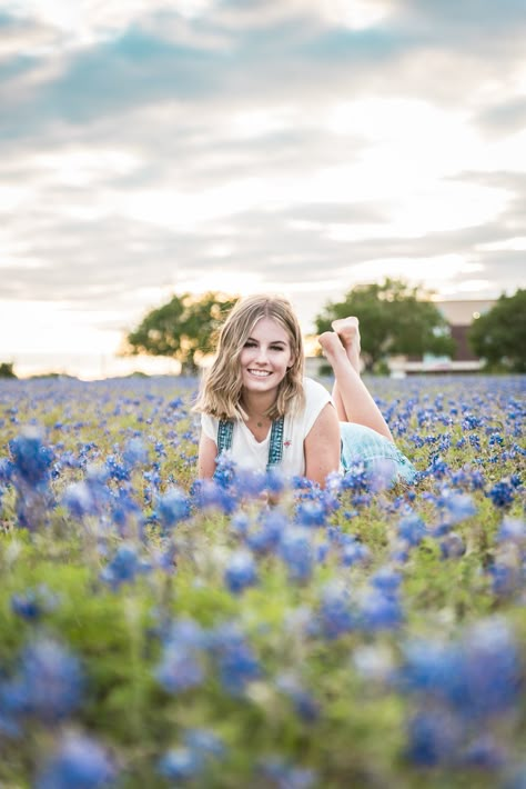 Senior Pictures in Bluebonnet Field Photo Ideas In A Field, Blue Bonnet Picture Ideas, Kids Bluebonnet Pictures, Blue Bonnet Photoshoot Outfits, Blue Bonnet Photoshoot Family, Pictures In Fields Photo Ideas, Senior Pics Wildflowers, Bluebonnet Photoshoot Family Pics, Bluebonnet Senior Pictures