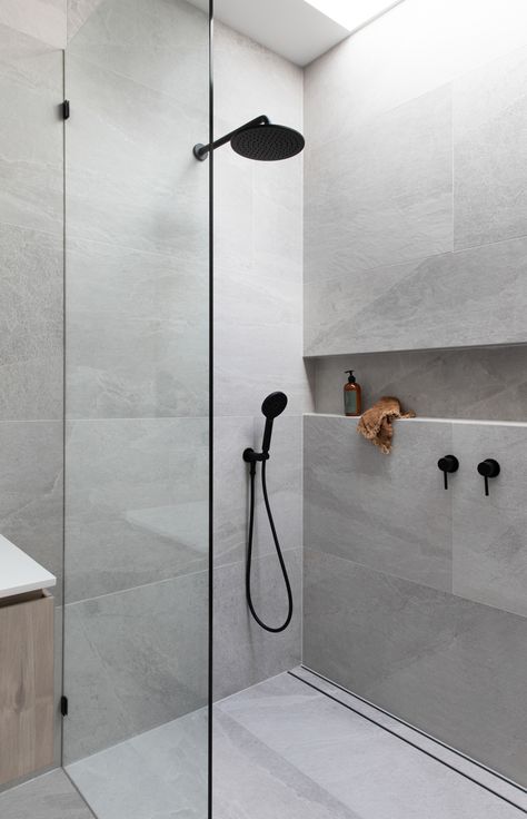 Bathrooms with large format tiles are beautiful and practical, with large seamless surfaces and less grout lines to clean.
But planning is key to ensure good fall to your shower, without the need for numerous tile cuts.
Click to read our blog on how to plan for this for your new bathroom, with Lauxes Grates Linear Floor Wastes.

Follow us on Instagram and Pinterest for all the latest home, reno and design tips, trends and products. Large Tile Bathroom, Large Shower Tile, Drømme Bad, Makeover Kamar Mandi, Large Tiles, Bilik Air, Bathroom Inspiration Modern, Bad Inspiration, Shower Niche