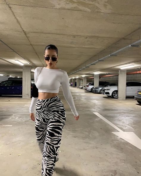 IVONA ZUPET 🦂 on Instagram: “I was hoping wearing these zebra trousers somewhere tropical but garage will do! Summer 2020 🤍 Wearing @prettylittlething #ad…” Zebra Print Pants, Zebra Pant, Dragon Lady, Looks Party, Y2k Aesthetic Outfits, Printed Wide Leg Pants, Print Pants, Baggy Pants, Instagrammer