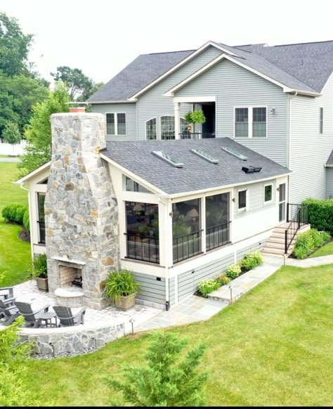 Sunroom Siding Exterior, 4 Season Porch Addition, Outdoor Living Space Under Raised House, 4 Season Porch With Fireplace, Sun Porch With Fireplace, Back House Addition, Screened In Porch On Concrete, Porch To Office Conversion, Sunroom Attached To House