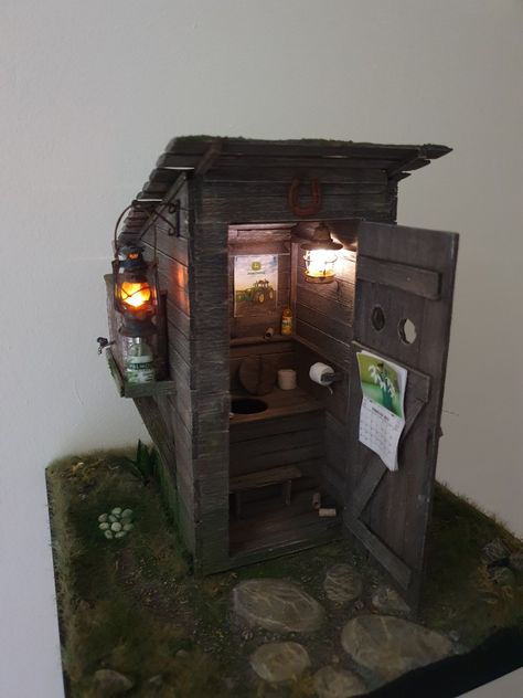 Outhouse toilet diorama with lights. Storm lantern and camping lantern. Micro led light solution. Miniature Outhouse, 1900s Farmhouse, Outhouse Toilet, Storm Lantern, Toy Photography, Camping Lantern, Camping Lanterns, Toys Photography, Led Light