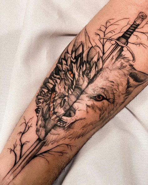 22 Powerful Game Of Thrones Tattoo Ideas For Hardcore Fans 7 Game Of Thrones Tattoos For Women, Finish Tattoo Ideas, Urban Legend Tattoo, Protector Tattoo Ideas, Drogon Game Of Thrones Tattoos, Got Dragon Tattoo, Got Tattoo Game Of Thrones, Large Dragon Tattoo, Tyrion Lannister Tattoo