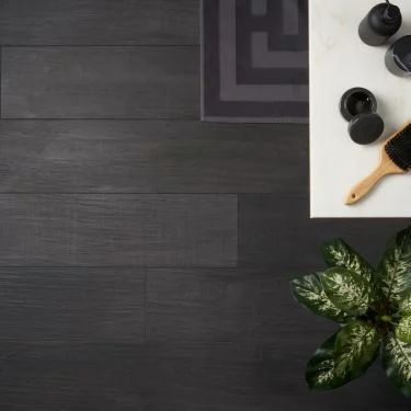 New Tile Products & Designs | TileBar.com Black Bathroom Wood Floor, Black Wood Look Tile, Wood Look Tile Backsplash, Dark Tile Floor Bathroom, Matte Black Tile, Bathrooms Minimalist, Media Room Ideas, Japanese Onsen, Black Backsplash