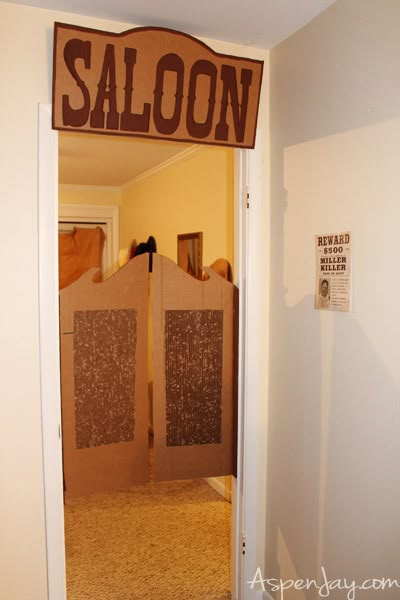 Western Photo Booth Backdrop, Cardboard Saloon Doors, Deadwood Saloon Party, Saloon Bar Ideas Western Theme, Saloon Birthday Party, Wild West Dinner Party, Diy Saloon Doors Cardboard Western Theme, Wild West Saloon Party, Saloon Party Ideas