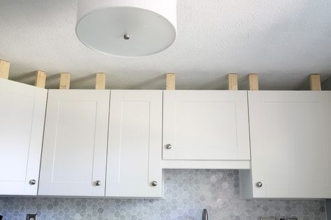 How to Install a Crown Molding to Kitchen Cabinets | JustAGirlAndHerBlog.com Kitchen Cabinet Crown Molding, Installing Kitchen Cabinets, Cabinet Molding, Crown Moldings, Kitchen Cabinets Makeover, New Kitchen Cabinets, Ikea Cabinets, Diy Kitchen Cabinets, Ikea Kitchen