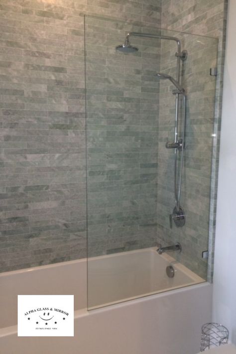 Frameless glass panels can add the missing sophistication your bathroom might need. This panel was designed, fabricated, and installed by Alpha Glass and Mirror. We have plenty in stock ready to go same day installation for standard shower and bath sizes.  #showerenclosure #tubglasspanel #bathroomremodel #showerglass #bathremodel #diybathroom #diytubpanel #glasspanel #diyideas #diyremodel #bathtub #tubpanel Tub Glass Panel, Bathtub Glass Panel, Glass Tub Enclosure, Glass Shower Tub, Glass Shower Panels, Bathroom Shower Doors, Rug Placement, Shower Over Bath, Frameless Shower Enclosures