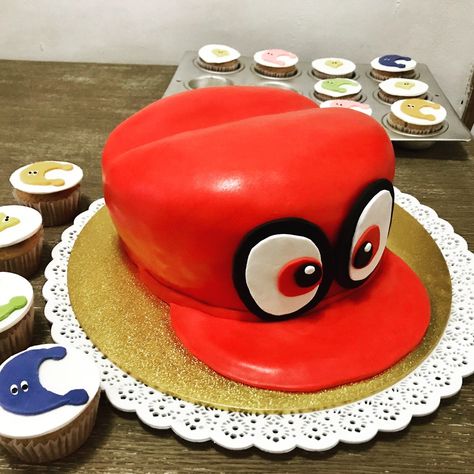 Mario Odyssey Cappy Cake Super Mario Odyssey Cake, Mario Odyssey Cake, Mario Odyssey Birthday Party, Nintendo Cake, Mario Bros Birthday Party Ideas, Mario Birthday Cake, Mario Bros Birthday Party, Super Mario Cake, Mario Cake