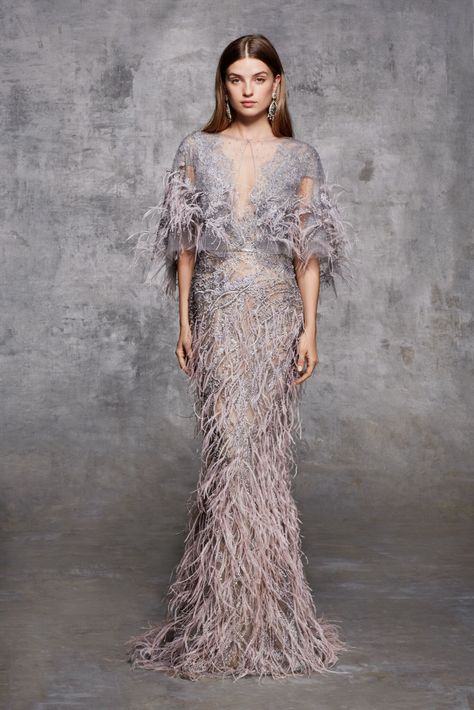 Illusion tulle cape with scattered pearl and ostrich feather embroidery. Feathered Prom Dress, Marchesa Fashion, Gaun Koktail, Feather Fabric, Faux Leather Trench Coat, High Fashion Trends, Collection Couture, Leather Trench, فستان سهرة