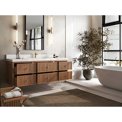 Elevate your bathroom with the Sonoma Floating Teak Vanity, a harmonious blend of timeless beauty and modern design. Crafted from rich, durable teak wood, this exquisite vanity floats effortlessly, creating a sense of space and elegance. The natural warmth and distinctive grain of the teak wood bring a touch of nature indoors, while the contemporary floating design adds a sophisticated, minimalist touch. With a spacious countertop for daily essentials and integrated storage solutions to keep you Bathroom Wood Vanity, Modern Floating Vanity, Calacatta Nuvo, Teak Vanity, Integrated Storage, Carrara Quartz, Double Sink Bathroom, Vanity Countertop, Double Sink Bathroom Vanity