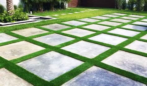 You will learn EXACTLY how to lay artificial grass in between pavers. Follow these easy steps to install it around paving slabs perfectly! Lawn Design Ideas, Laying Artificial Grass, Artificial Grass Patio, Grass Driveway, Artificial Grass Backyard, Turf Backyard, Affordable Landscaping, Grass Backyard, Grass Pavers