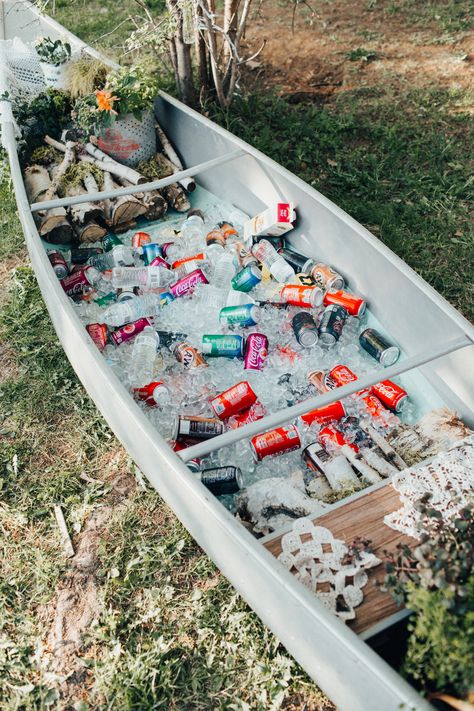 How cute is this drinks canoe used at this northern Minnesota backyard wedding?! Find more of this beautiful wedding in link! #backyardwedding #canoe #drinkscanoe #weddingreception #woodsywedding #woodsydecor #minnesotawedding #diywedding Drinks Outdoor Wedding, Canoe With Drinks, Wedding Canoe Drinks, Canoe Bar Wedding, Backyard Woodsy Wedding, Summer Backyard Wedding Ideas Receptions, Drink Canoe Wedding, Canoe Wedding Decor, Canoe Drinks Wedding