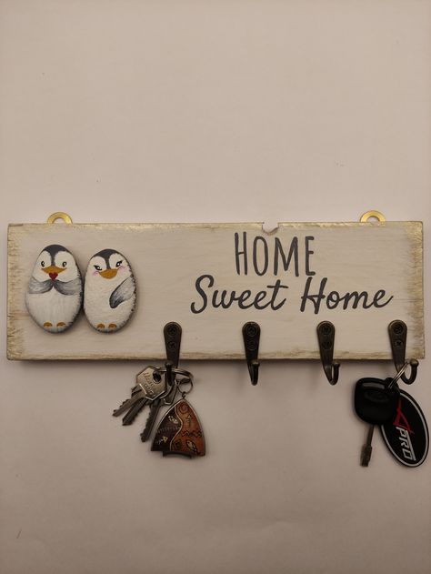 Personalized key holder is a great housewarming gift or wedding gift for newlyweds! This key hanger will brighten your home and will suit almost any decor. It will be the perfect gift for any occasion. This design has the phrase "Home Sweet Home", or we can write as you want, such as a surname. The base is made of wood - board 30x10x1.5 cm. “The figurines are made of sea pebbles and painted by hand with acrylic paints. “The text was written by hand with acrylic paints. Penguins In Love, Two Penguins, Personalized Key Holder, Wedding Gifts For Newlyweds, Wooden Key Holder, Gift For Newlyweds, Key Holders, Key Hanger, Wooden Planks