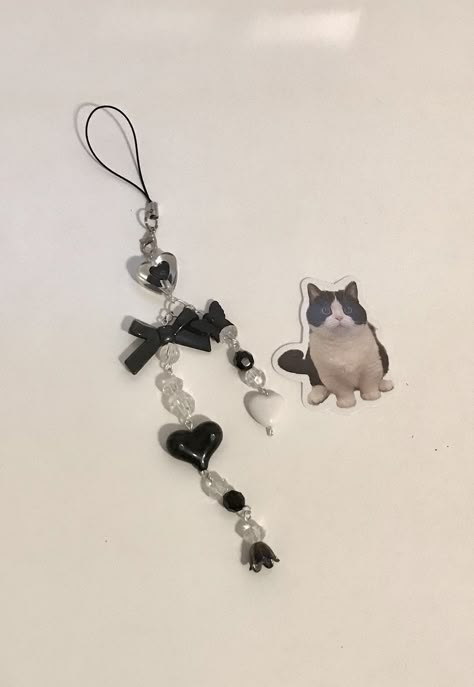 🌑 The prettiest Keychain / Phone Charm decor to hang on something! With the black beads and white beads, it creates a really pretty phone charm or keychain! -- This item is a little fragile due to the fact the beads can break. Do not throw or do any aggressive act on this item! ~ Policy ~ -- All sales are final, no returns or refunds.  -- I take 1-3 days to process your item, I could take longer, depending on how busy I am! -- I am not responsible for lost / missing packages! If your item is da Iphone Keychain Beads, Black And White Phone Charm, Keychain Beads Ideas, Black Phone Charm, Black And White Keychain, Preppy Items, White Keychain, Phone Keychain, Y2k Phone