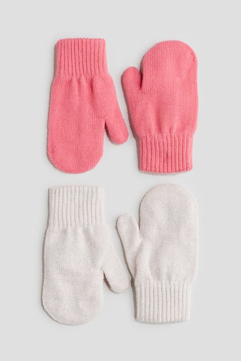 Soft, knit mittens with ribbed, elasticized cuffs.