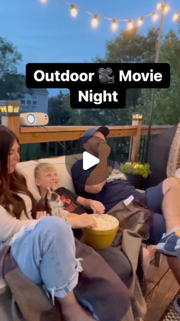 Amanda Albrecht Illinois Realtor + Content Creator on Instagram: "Outdoor Movie 🎥 Night! This was so fun for the whole family and easy to set up. 

I used no hole vinyl hooks to easily attach the cloth screen to the back of the home. 

Next we set up our mini projector which was under $80 and only needed an extension cord and your phone to operate.

Can’t forget the candy and popcorn 🍿 

Save for later and follow @sellingthesuburbs for more! 
.
.
.
#home #family #movienight #outdoormovie #outdoormovienight #familymovienight #familyactivities #kidapproved #datenight #howto #outdoorspaces #realtor #realestate #momsofinstagram #momstyle #napervillemoms #momsofboys #momsofplainfield #bestofplainfield #sellingthesuburbs #realtoring #realtormom #outdoorentertaining #diyoutdoors #homesweethome Outdoor Movie Projector Set Up, Outdoor Movie Set Up, Movie Night Ideas Outdoor, Outdoor Projector Ideas, Outdoor Movie Night Ideas, Outside Projector, Realtor Content, Outdoor Projector Screen, Outdoor Movie Night