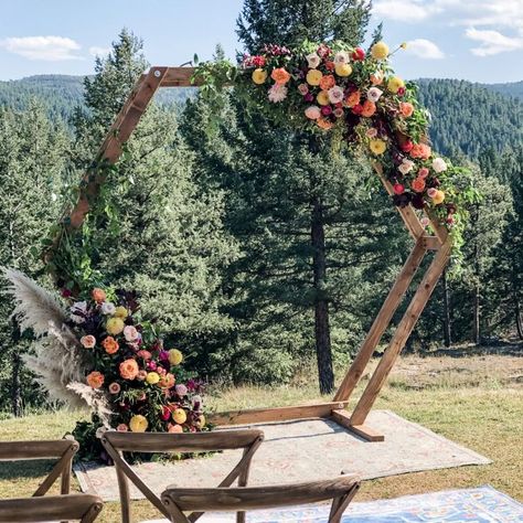 Hexagon wedding arch flowers