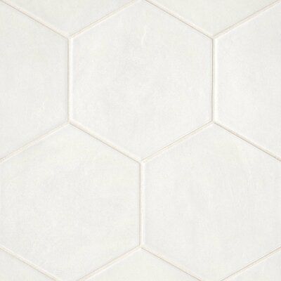 Add geometry to your floors and walls with Allora, an Italian-made matte porcelain tile. The neutral colors blend well with any room style. Create a solid-colored look, and a complete patterned design, or combine the solids and decor for your look. Color: Solid White | Bedrosians Allora 9" x 10" Porcelain Wall & Floor Tile Porcelain in White | 10 H x 8.5 W x 0.375 D in | Wayfair Hexagon Floor, Bedrosians Tile, Matte Porcelain Tile, Hexagon Tiles, Hexagon Pattern, Porcelain Floor Tiles, Porcelain Flooring, Wall And Floor Tiles, Shower Floor