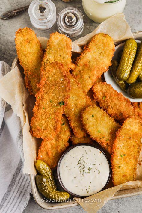 This homemade recipe for fried pickles is easy to make and oh-so delish. Everyone loves some deep-fried dill spears or slices with ranch dressing or dip! The batter is so easy to make, too. Quick, easy, and delish for snacks or appetizers. Enjoy with all those favorites for game day. #friedpickles #spendwithpennies #recipeeasy #recipedeepfryer Easy Deep Fried Pickles, Fried Dill Pickles Recipe, Fried Dill Pickles, Deep Fried Pickles, Fried Pickles Recipe, Spend With Pennies, Taco Dip, Fried Pickles, Cheese Ball Recipes